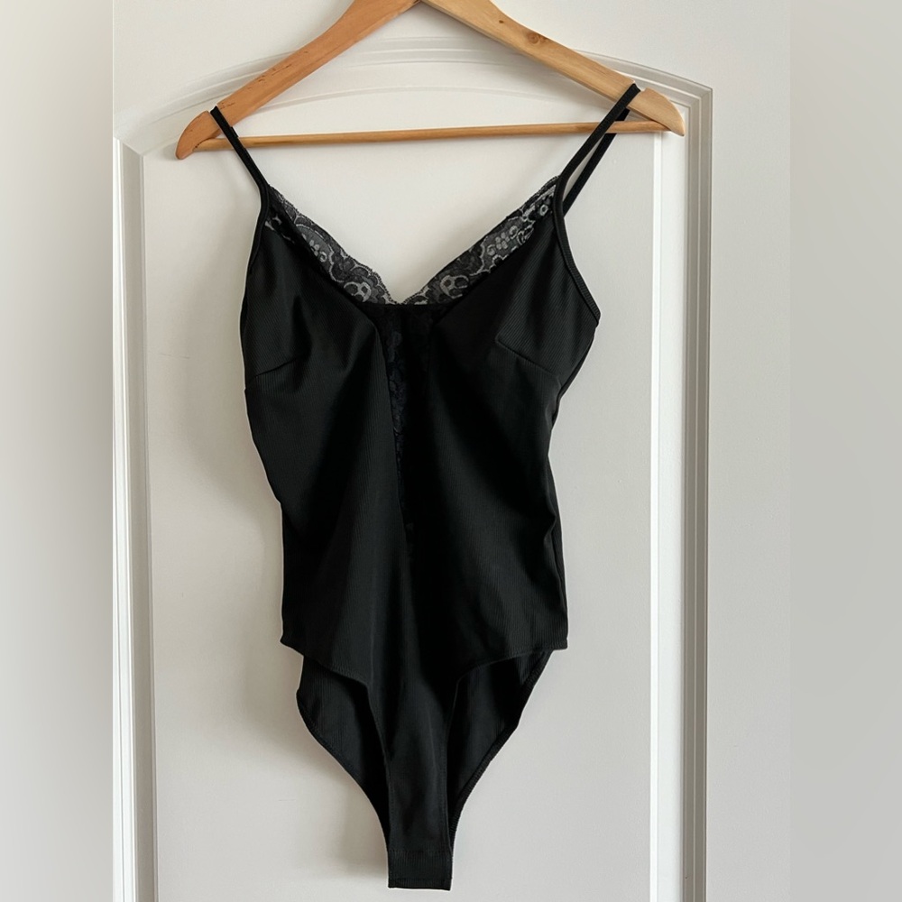 Black women’s bodysuit . Size small